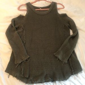 FREE PEOPLE shoulder-less green sweater.